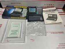 Casio Digital Diary SF-4000 Organizer & Calculator with box and manual - Works picture
