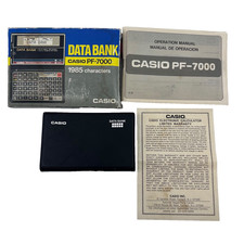 Casio PF-7000 Data Bank Organizer Open Box Complete w/ Box Case Manual Vintage picture