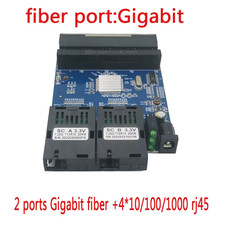 10/100/1000M switch 4 RJ45 UTP 2 SC Gigabit Fiber Optical Media Converter 2SC 4  picture