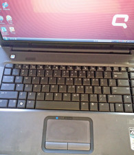 Compaq Presario F700 Laptop (GR971UA#ABA)  AMD Athlon 64X2 DUAL CORE ram 32 bit picture