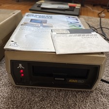 Atari 810 Disk Drive, manual, master disk powers on / power cord picture