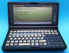 Vintage HP 200LX Handheld Graphic Display PC Palmtop 2MB Powers On picture