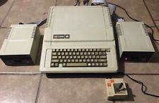 VTG Apple IIe A2S2064 W/ A2M0003 Disk Drives Joystick & Manuals Turns On Works picture