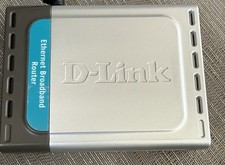 D-Link DI-604 Wired Ethernet Router Silver Gray with Power Adapter picture