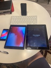 Two iPhones An iPad First Generation Another iPad And A Wireless Keyboard(As Is) picture