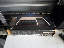 Texas Instruments TI-99/4A  Home Computer In Box  W Cables And Manuals.  picture
